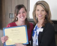 Brenda Fischer presenting award